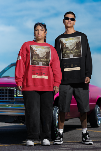 Latino man and woman wearing sweatshirt with Song cover art for 