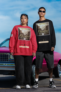 Latino man and woman wearing sweatshirt with Song cover art for "Liner Notes (Chop it up Cleveland) by Kayode ft Krayzie Bone. Classic boxcar is parked behind them with partly cloudy blue sky.