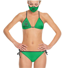 Load image into Gallery viewer, Invisible Tongues triangle logo on the left breast of an emerald-green bikini.